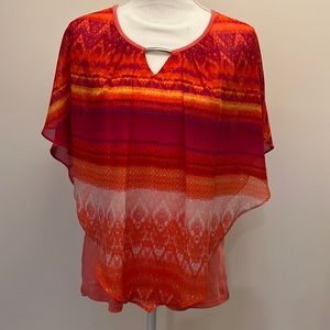 Flowing top with full tank underneath